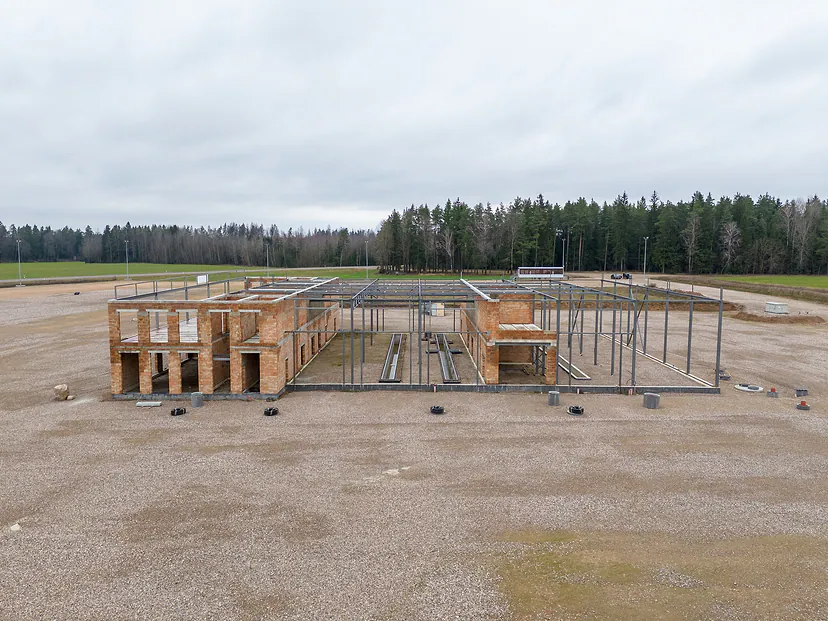 Building frame in the middle of a field