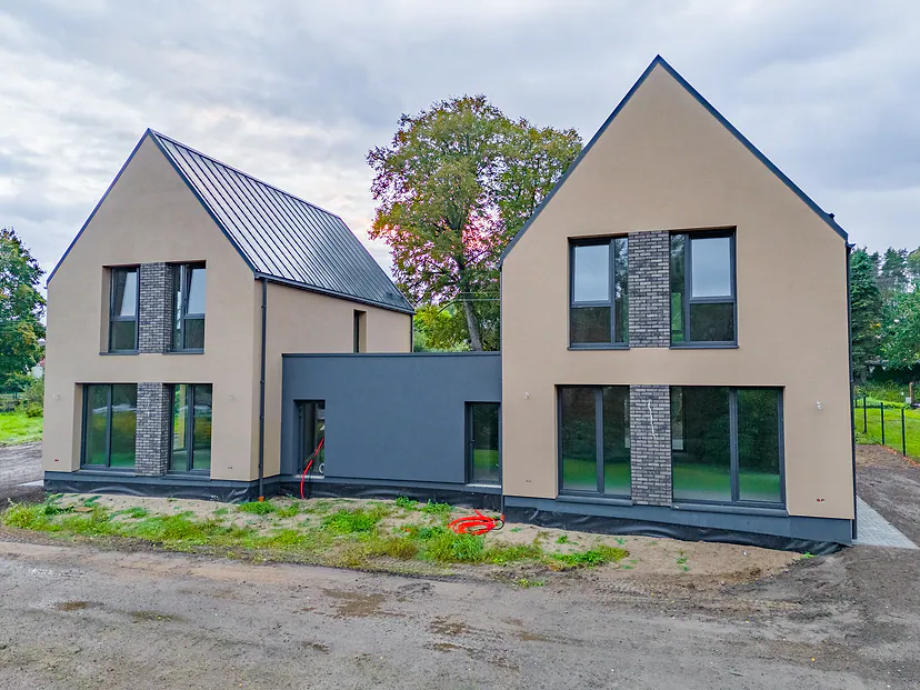 New duplex house with gable roofs, seen from the front