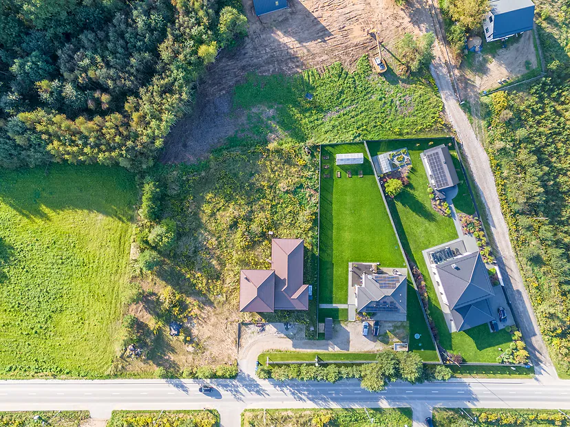 New plots and houses by the road, view straight from above