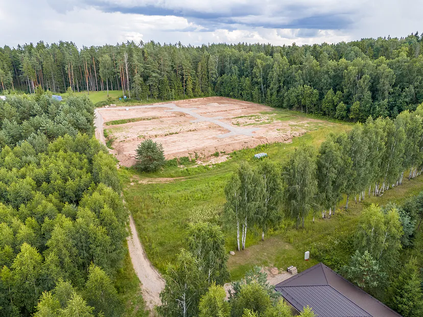 Plot ready for construction, surrounded by forest