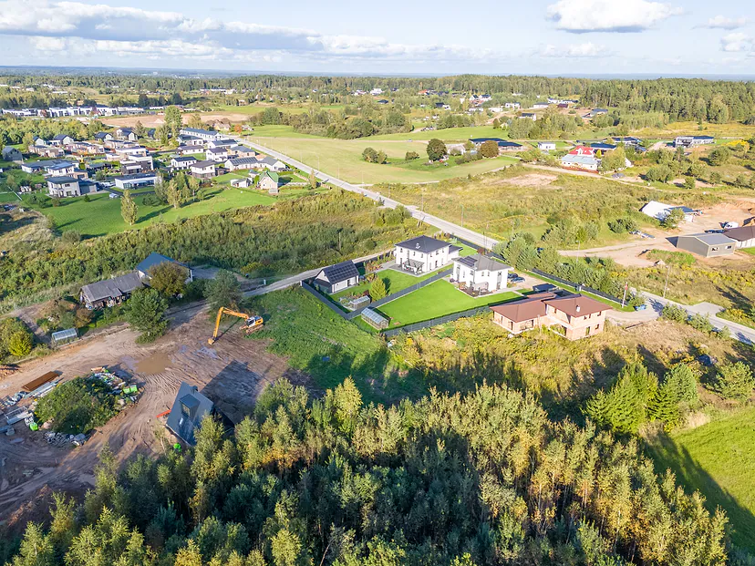 Neighborhood of new houses with plots on a sunny day