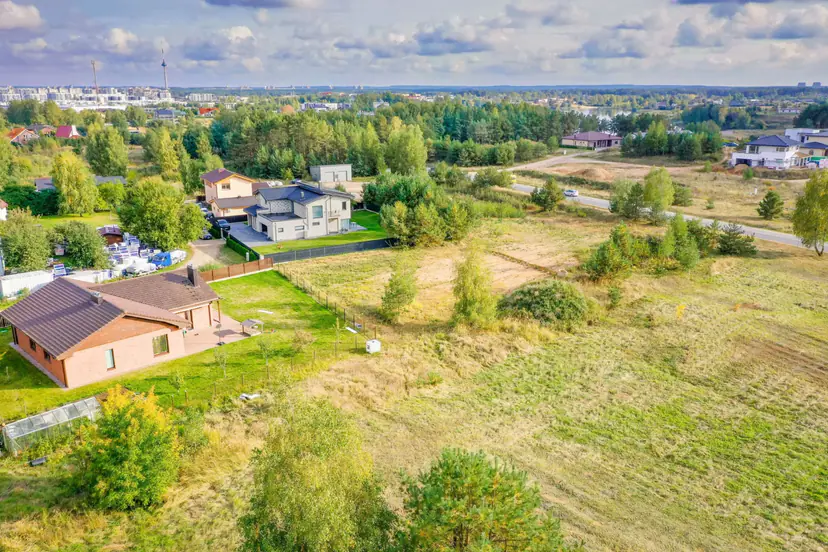 A typical listing photo: 16:9 with black bars, tilted, too dark and soft