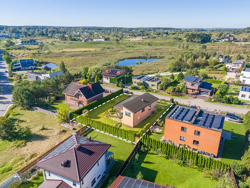The same house from higher up: the plot, neighbors, ponds and fields
