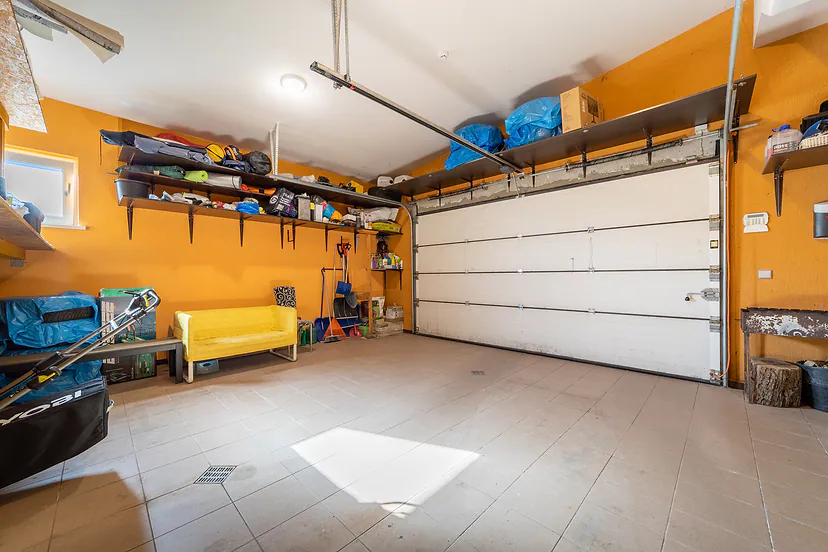 Garage with shelves and the garage door
