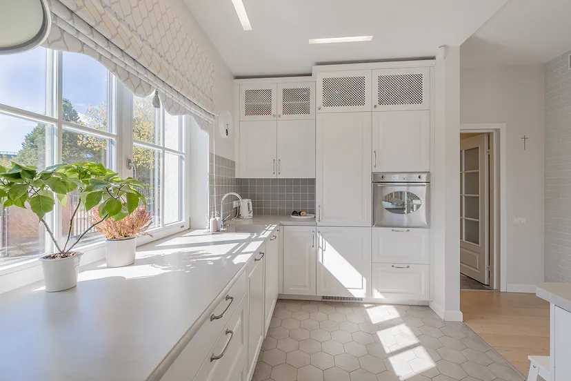 White kitchen with a window