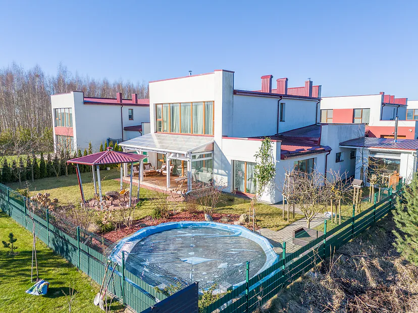 House with a pool, gazebo and terrace from the air