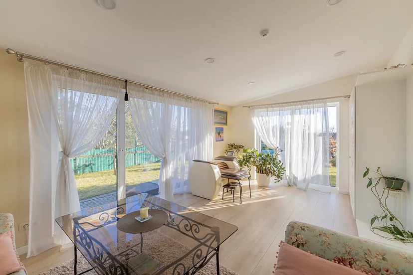 Bright room with windows on three sides
