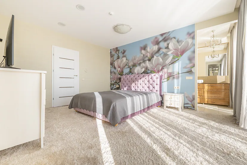 Bedroom with floral wallpaper