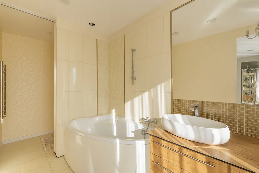 Bathroom with a bathtub and a sink