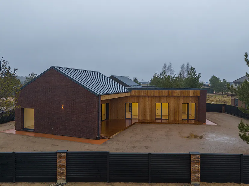 The house and fence from the air on a hazy day