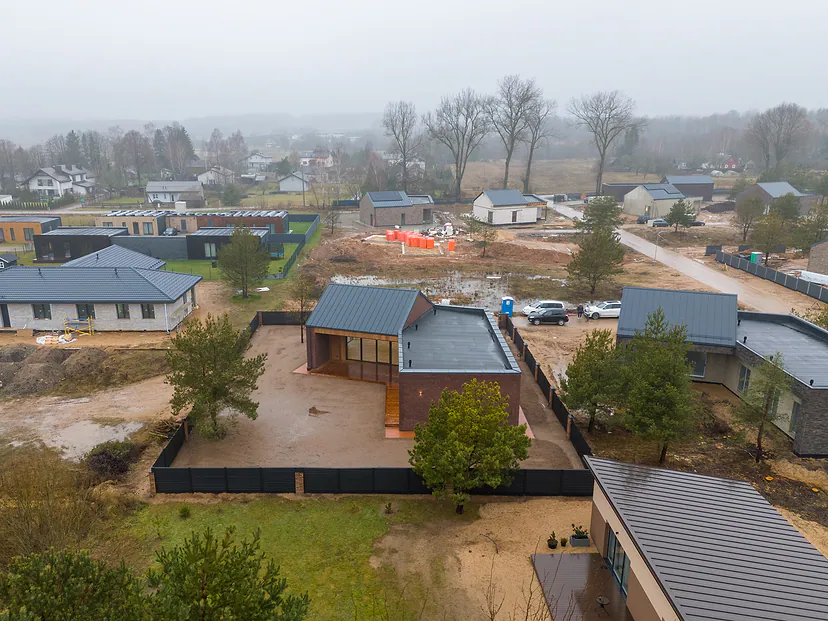 The house among its neighbors from the air
