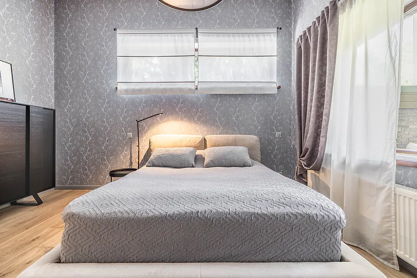 Bedroom with grey wallpaper