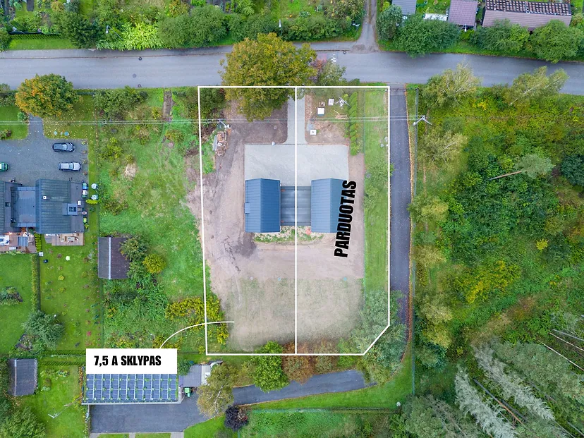 Plot with marked boundaries and the word SOLD, view from above